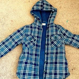 Cotton flannel jacket with polyester inner body.